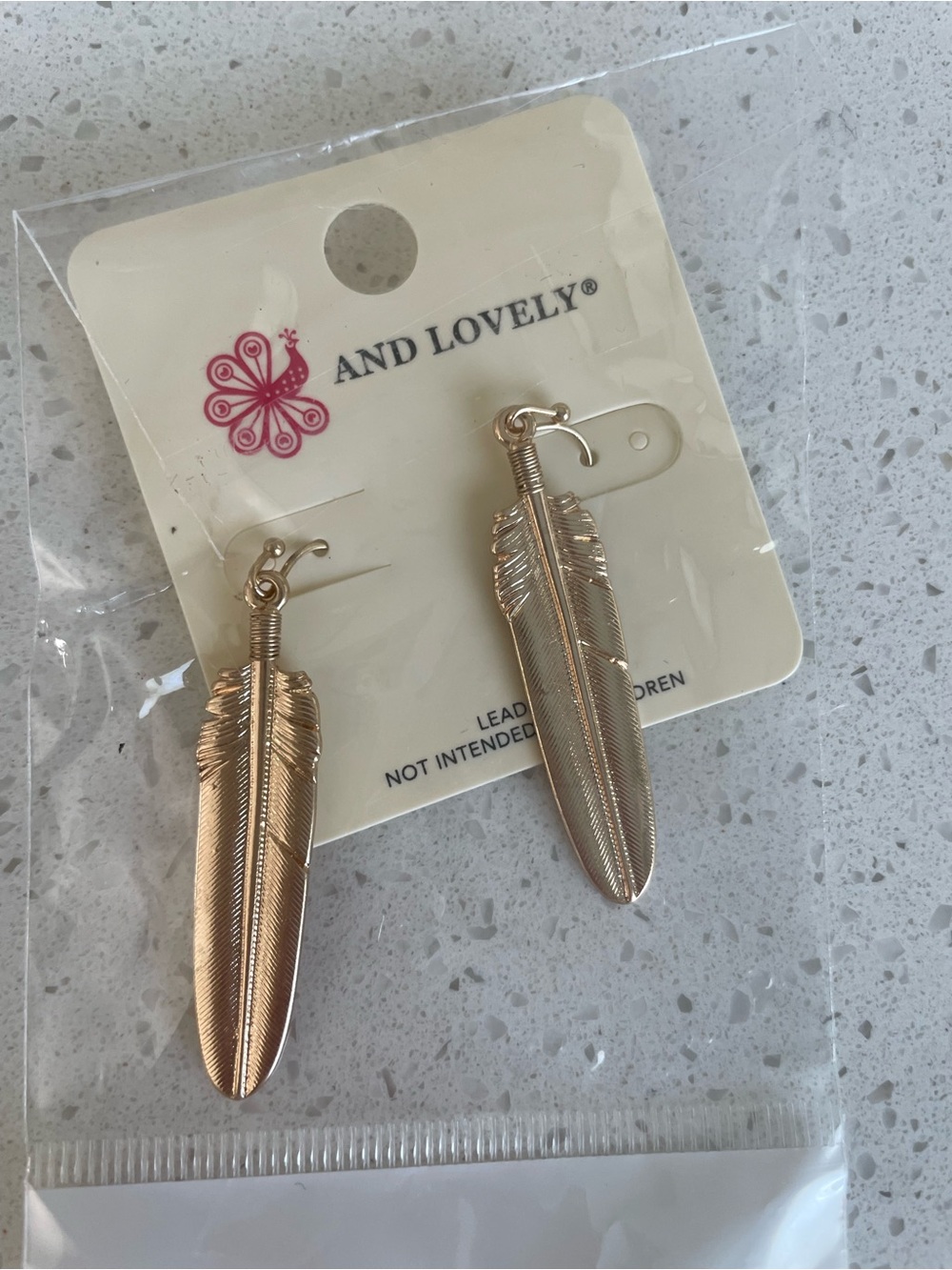 And Lovely Feather Drop Earrings Gold Tone New with tags